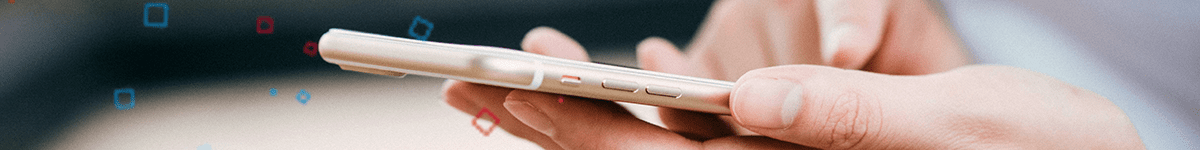 hand holding mobile device with ingenious med branded squares